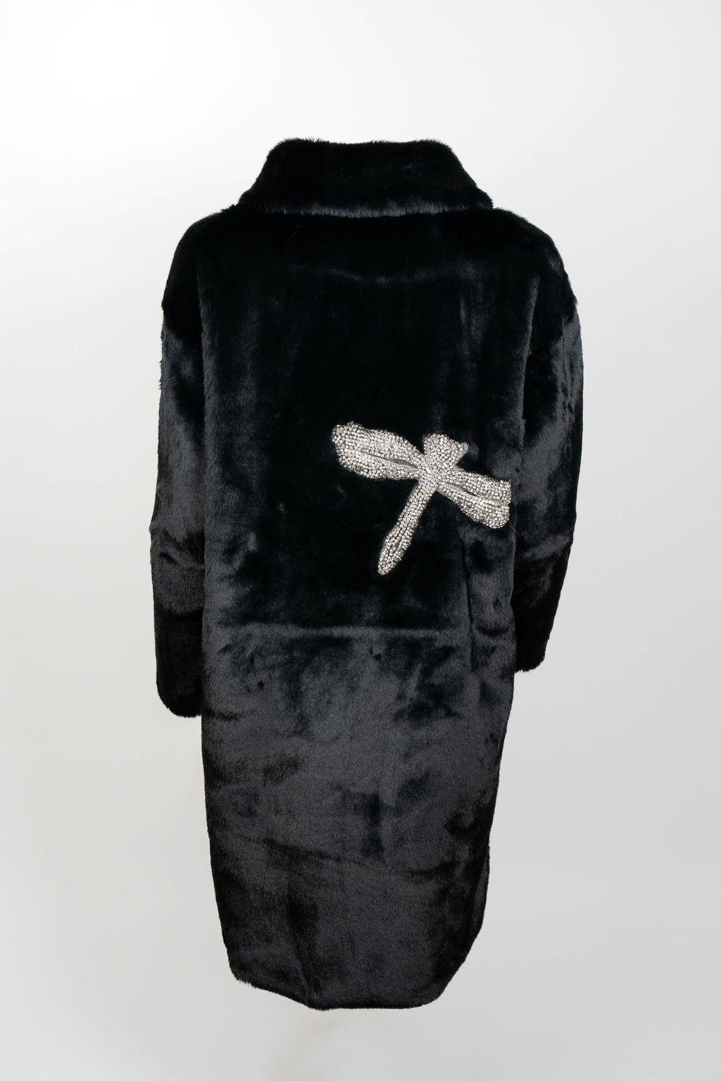 Back view of black faux fur jacket with sparkling crystal dragonfly embellishment — part of the Mr. Greys collection.