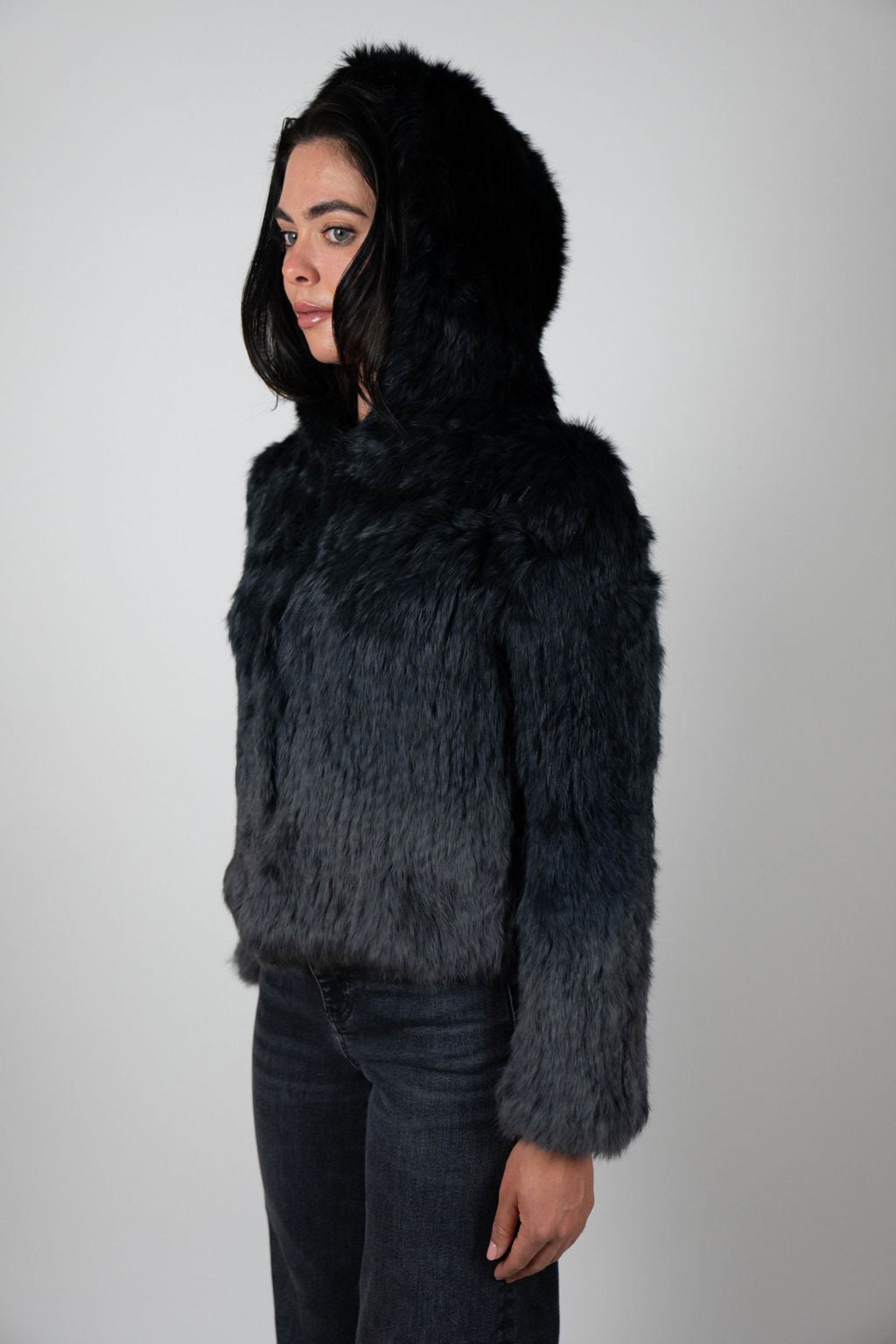 Side view of charcoal rabbit fur hooded crop jacket with hood on – Angel Wings by Lucy Luxe Collection