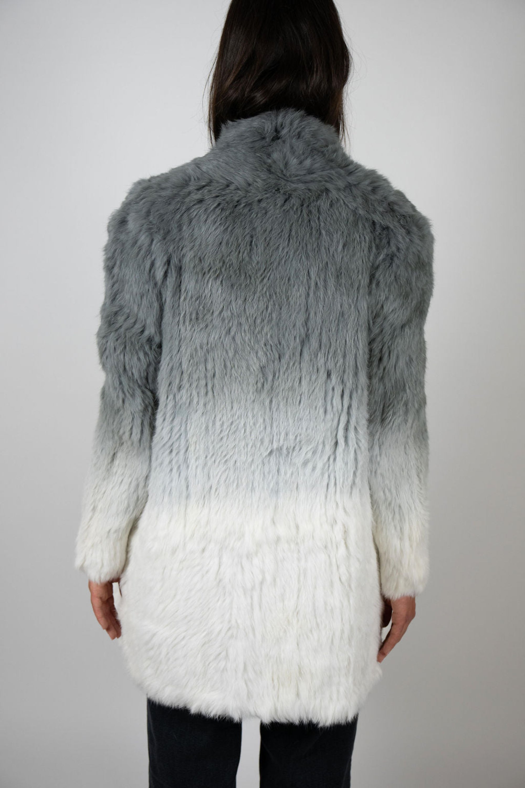 Back view of grey and white ombre rabbit fur swing coat