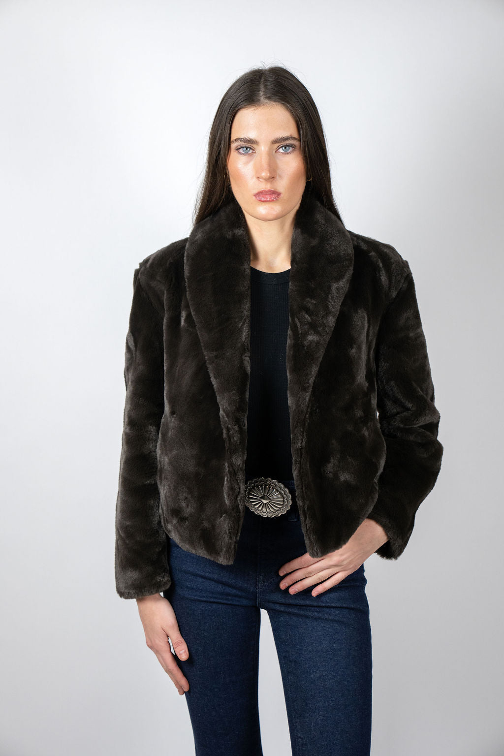 Model wearing the Bear Den Crop Jacket in Chocolate by Angel Wings by Lucy, a luxury faux fur cropped jacket designed for elevated winter styling.