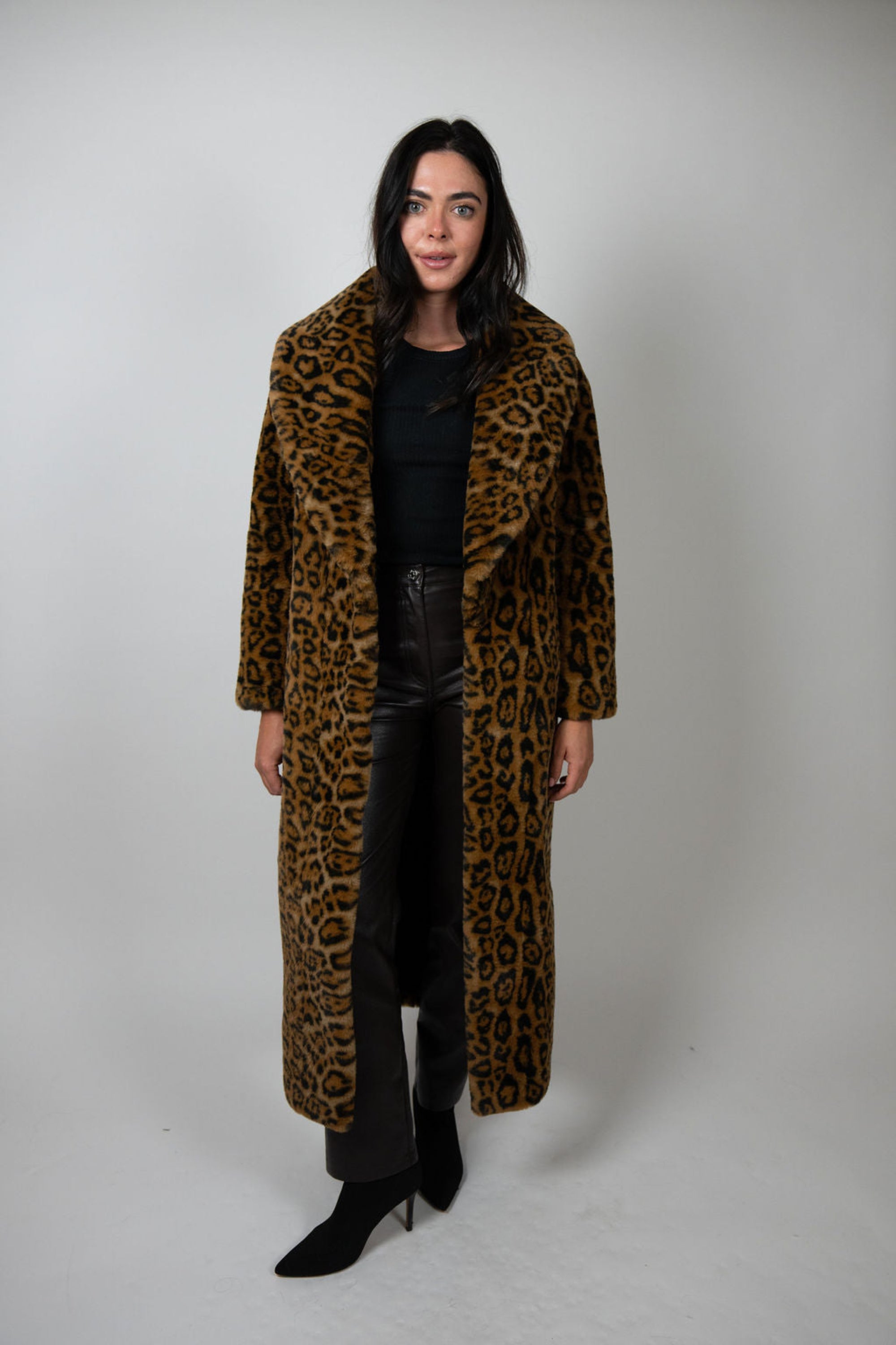 Model wearing full-length faux fur leopard print coat by Angel Wings by Lucy – front view