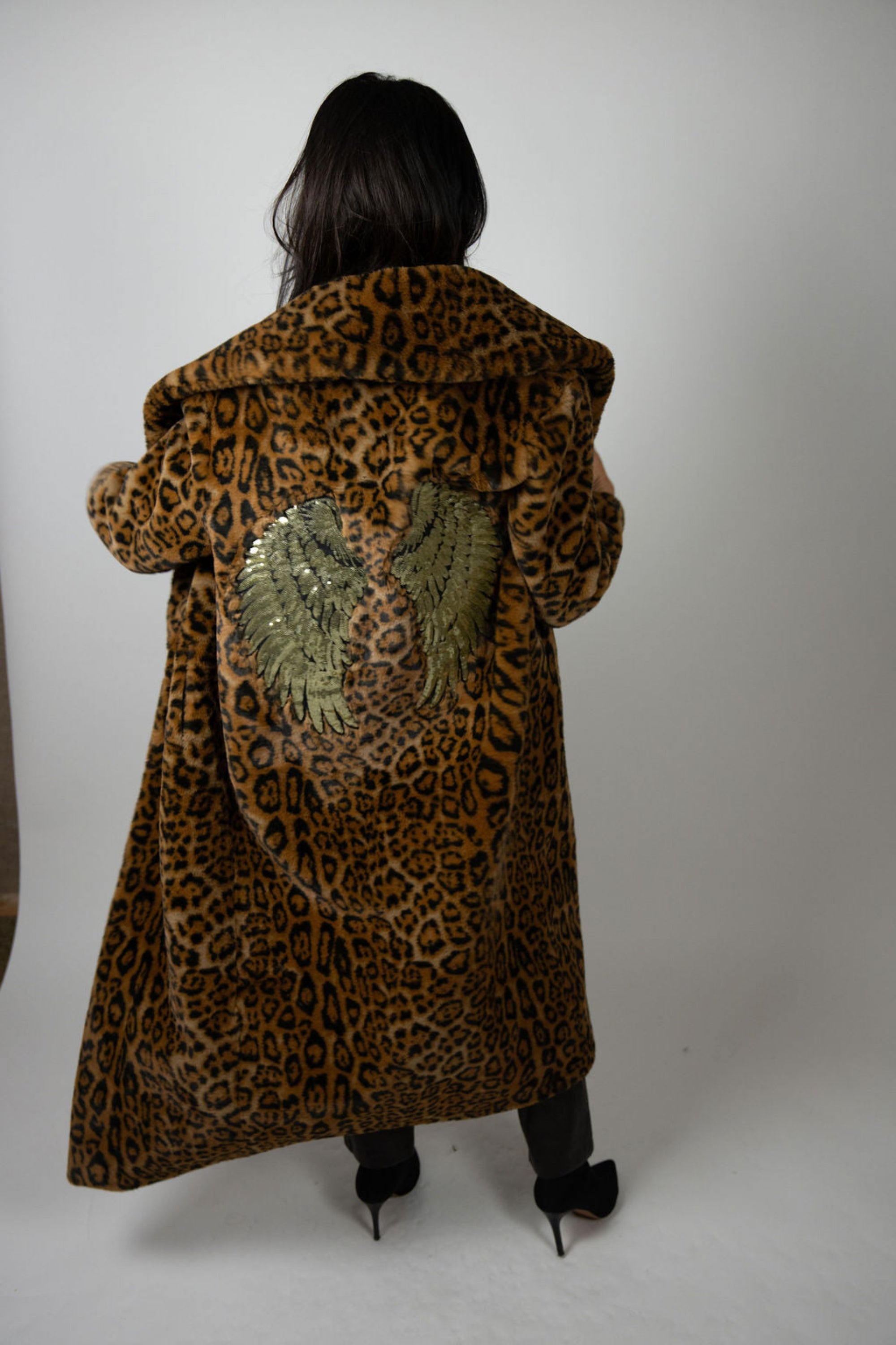 Model turns in Ajax Jacket by Angel Wings by Lucy – showcasing luxe leopard print