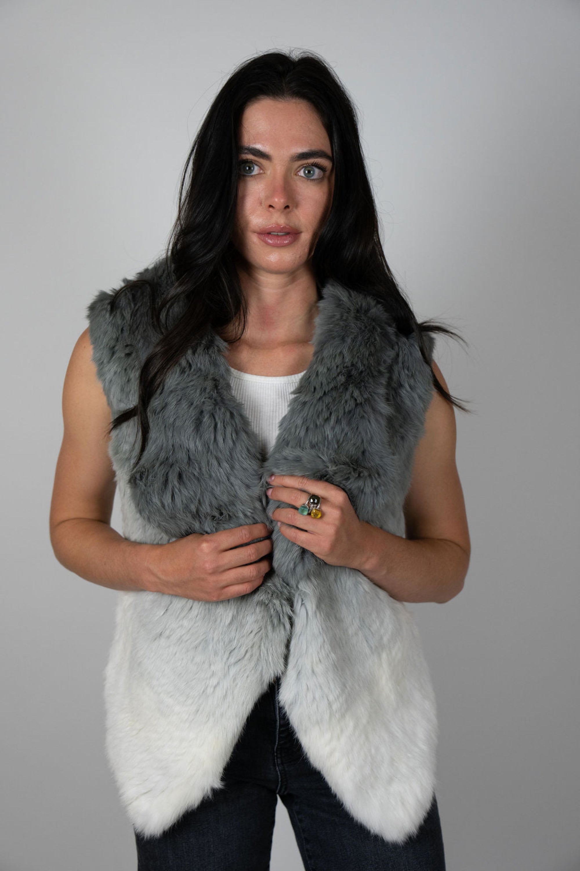 Angel Wings by Lucy rabbit fur vest in pale grey ombré, sleeveless and open-front, worn by model facing front.