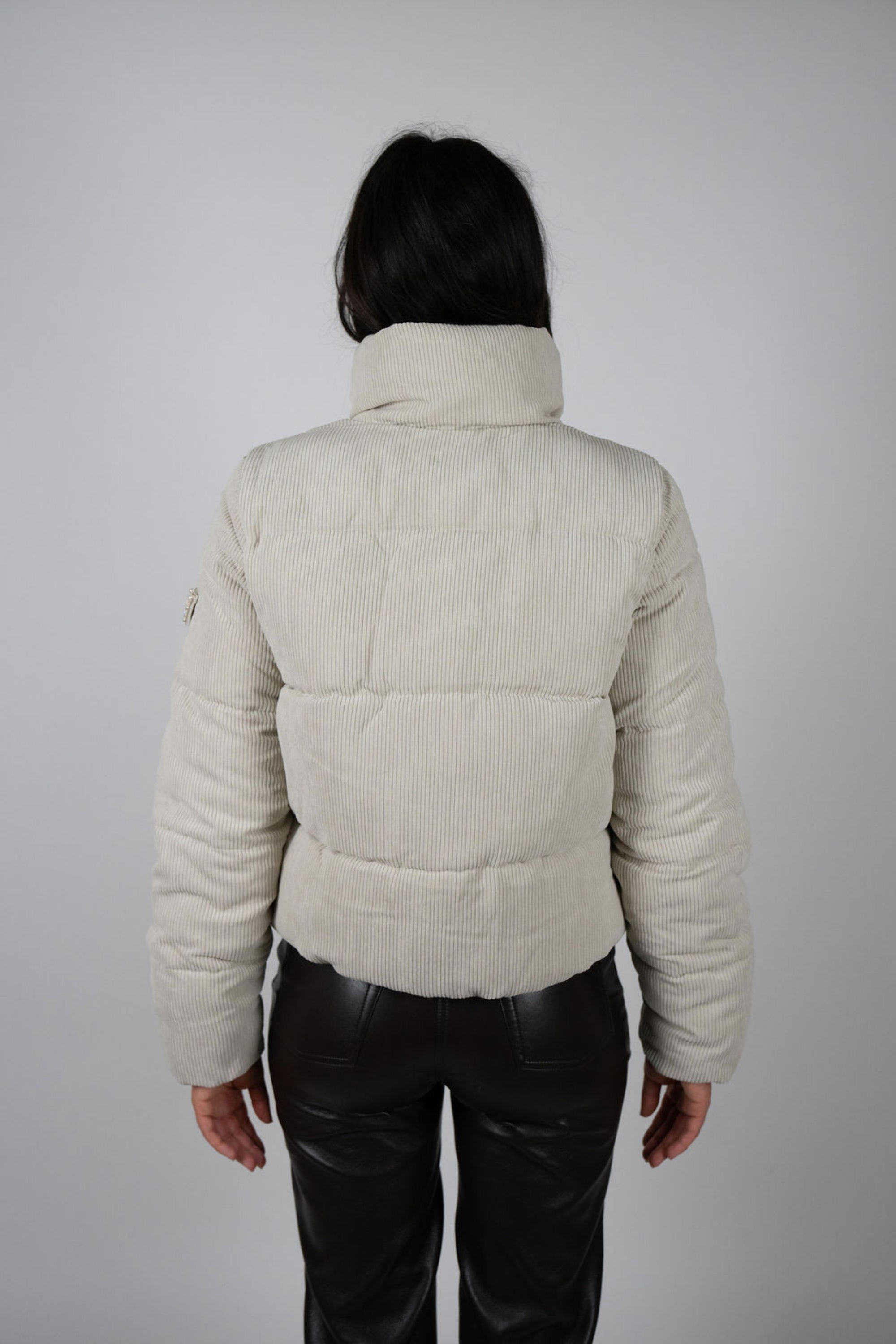 Back of the Angel Wings Sundeck Jacket showing quilted panels and raised collar
