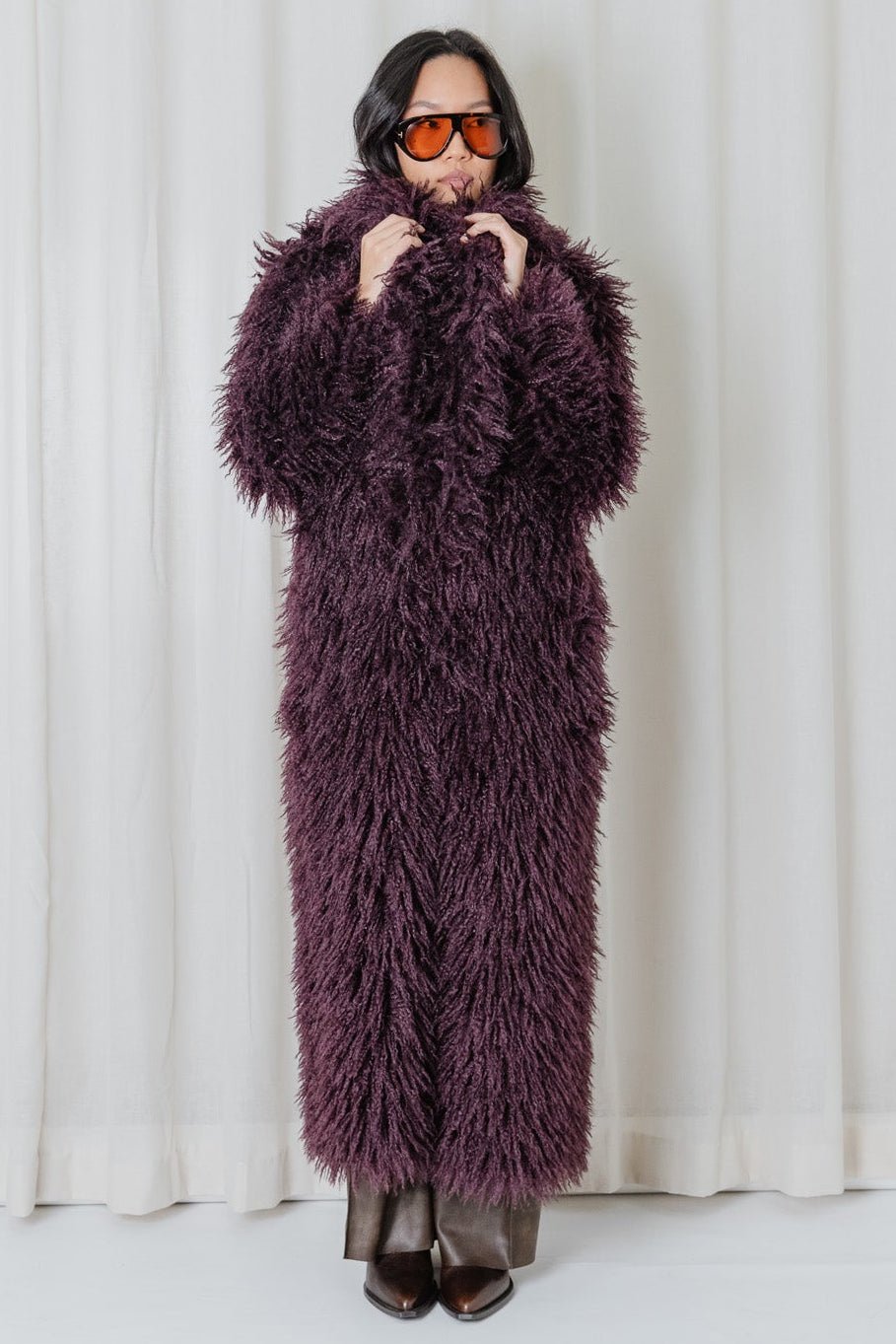 Full-length front view of the Angel Wings Yeti Coat in Bordeaux with a relaxed longline silhouette