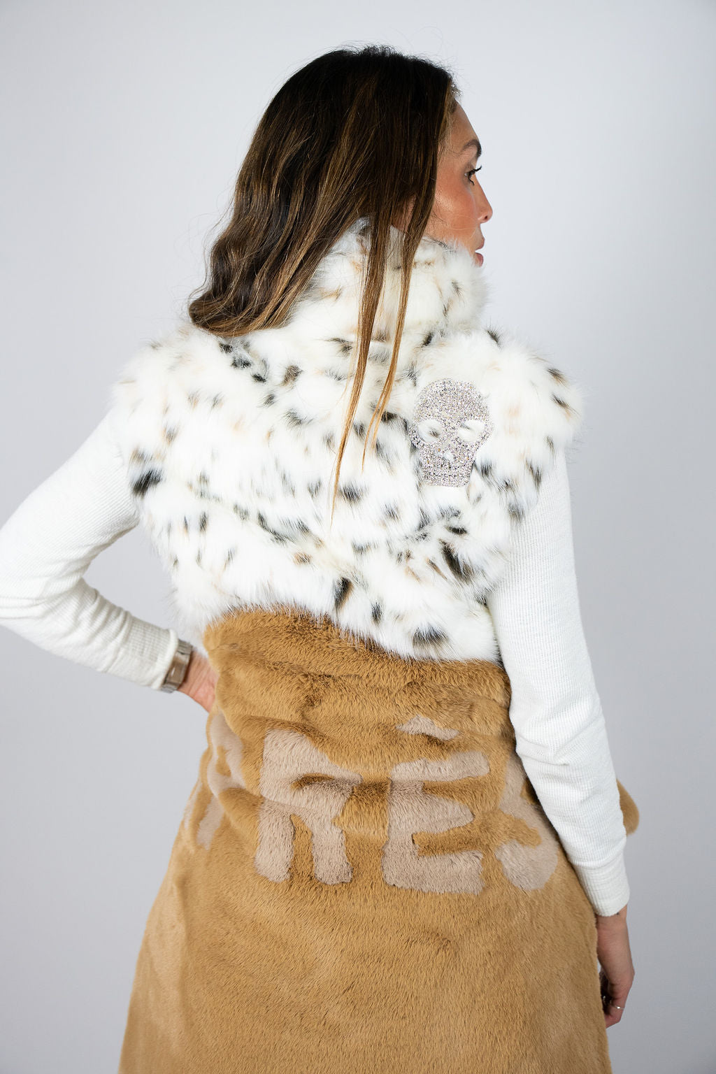 Luxury faux fur crop vest for après ski fashion
