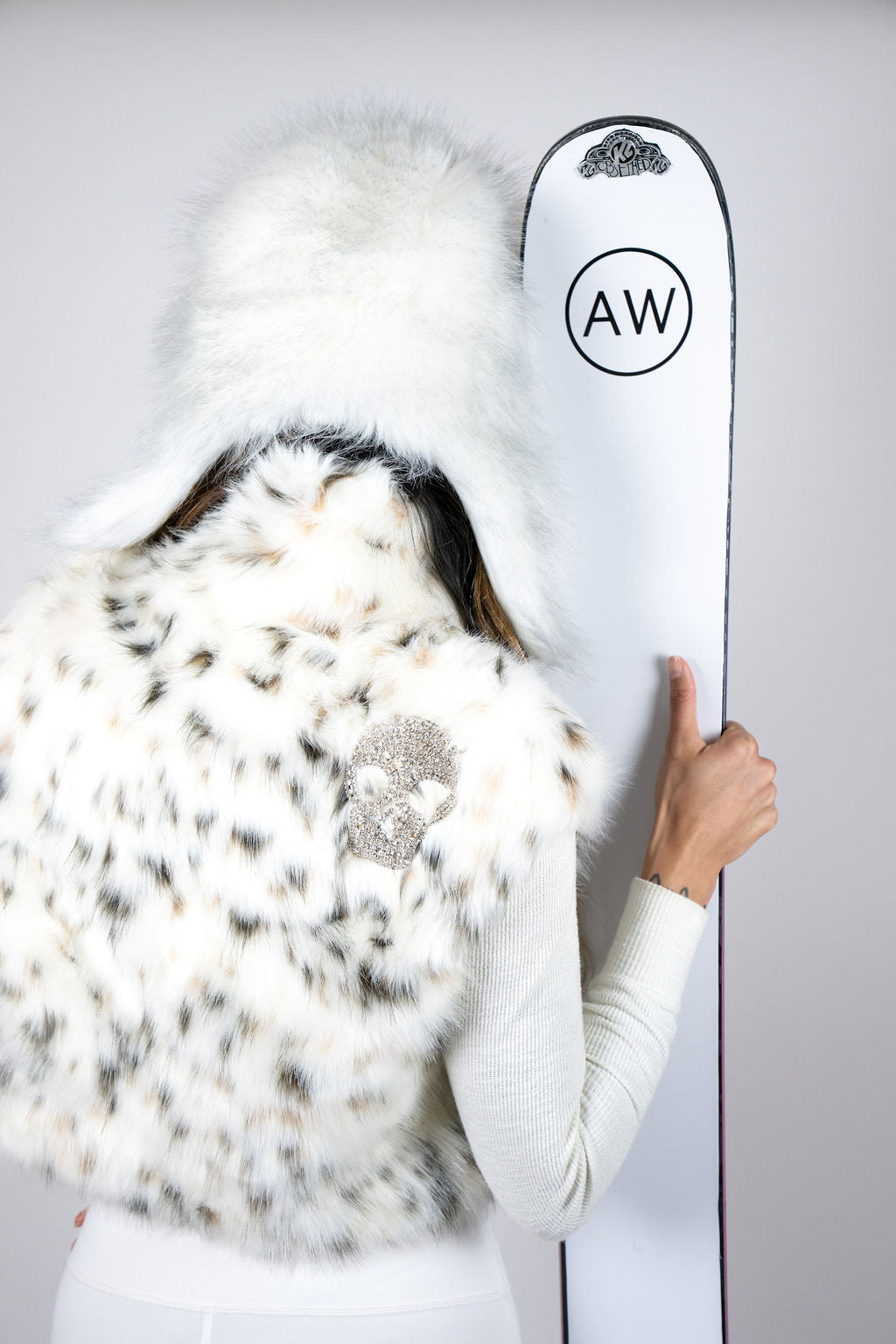 Luxury faux fur après ski crop vest for women with statement winter fashion styling