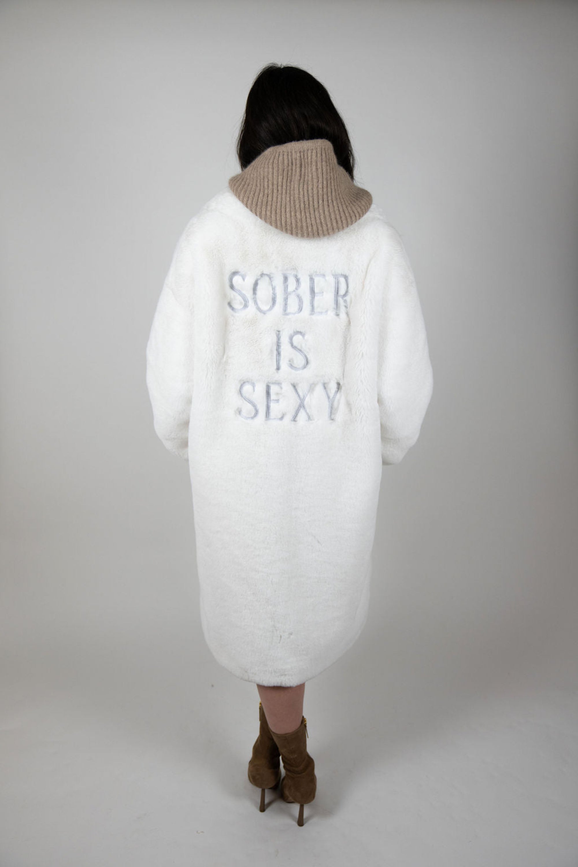 Back view of oversized white faux fur jacket with relaxed fit and soft texture – Mr Greys by Angel Wings by Lucy