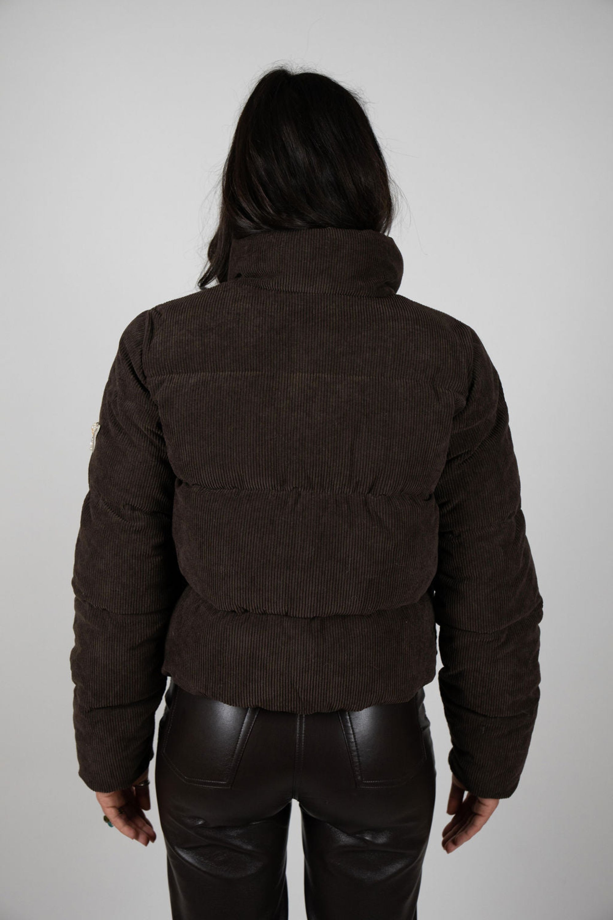 Back of the Angel Wings Sundeck Jacket showing quilted panels and raised collar