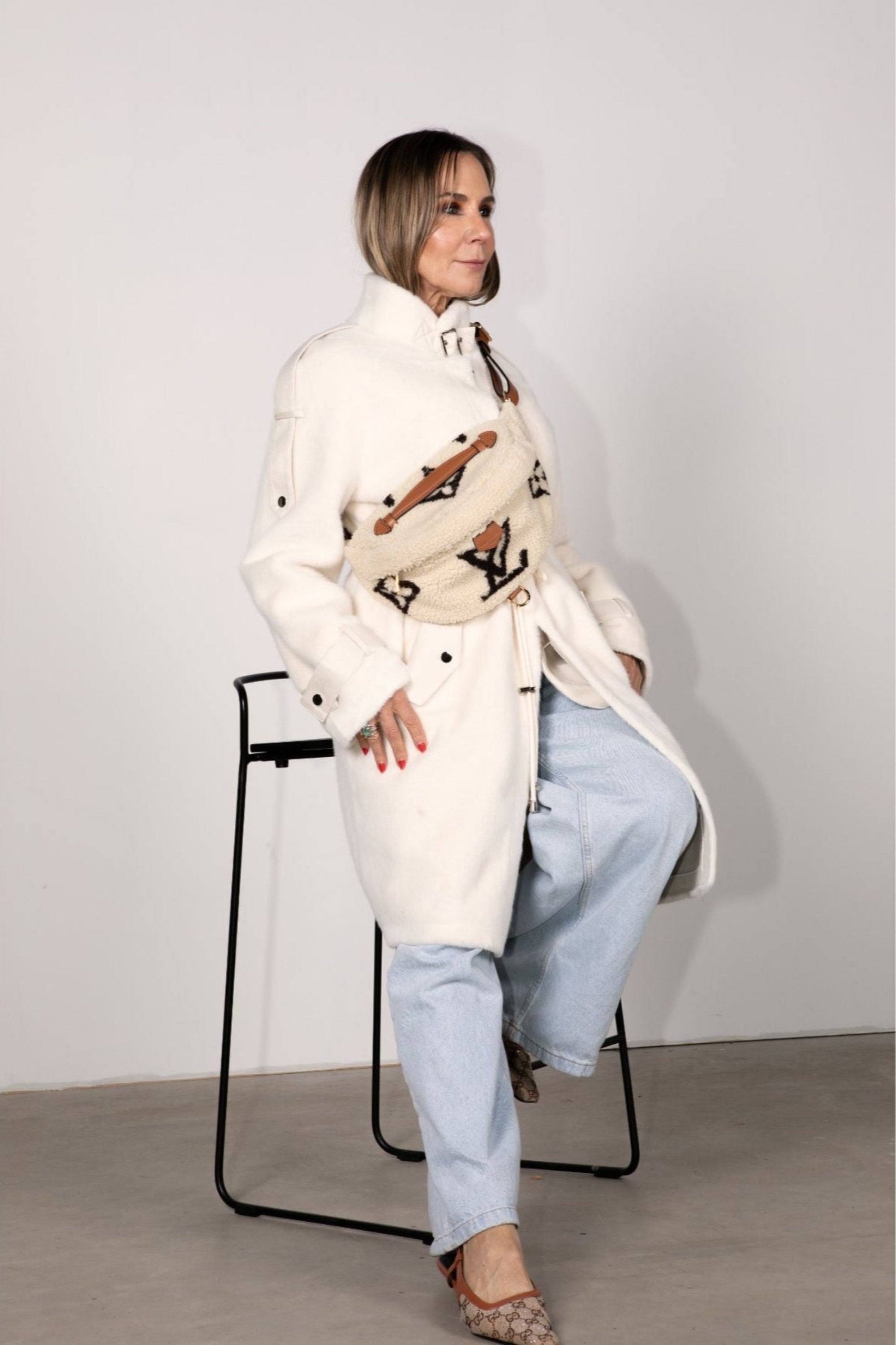 Front view of cream faux fur jacket with drawstring waist, buckle collar, and faux suede trim — the bestselling Chica Chica style in Vanilla.