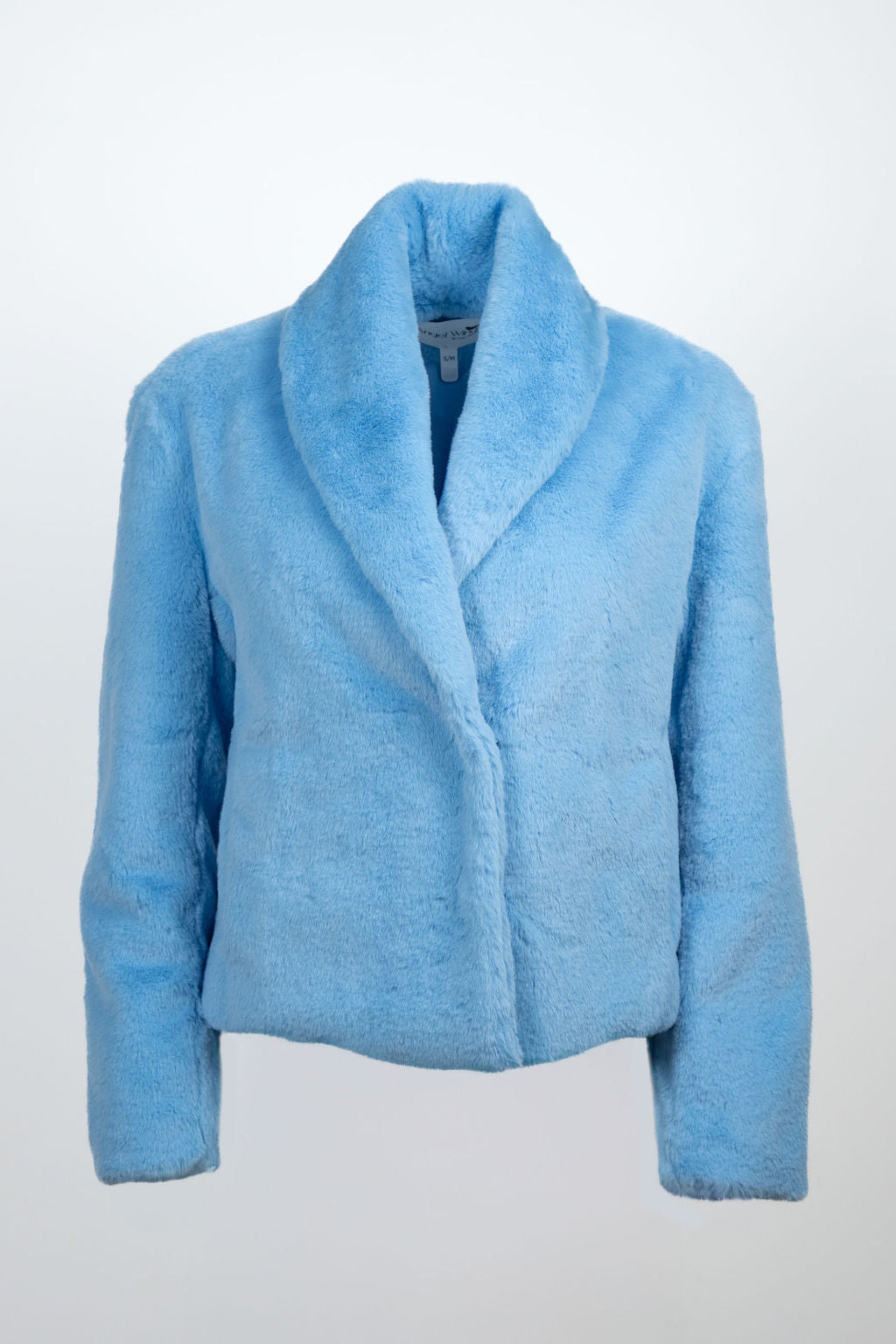 Woman wearing cropped sky blue faux fur jacket with wide-leg denim – Bear Den Crop Jacket by Angel Wings by Lucy