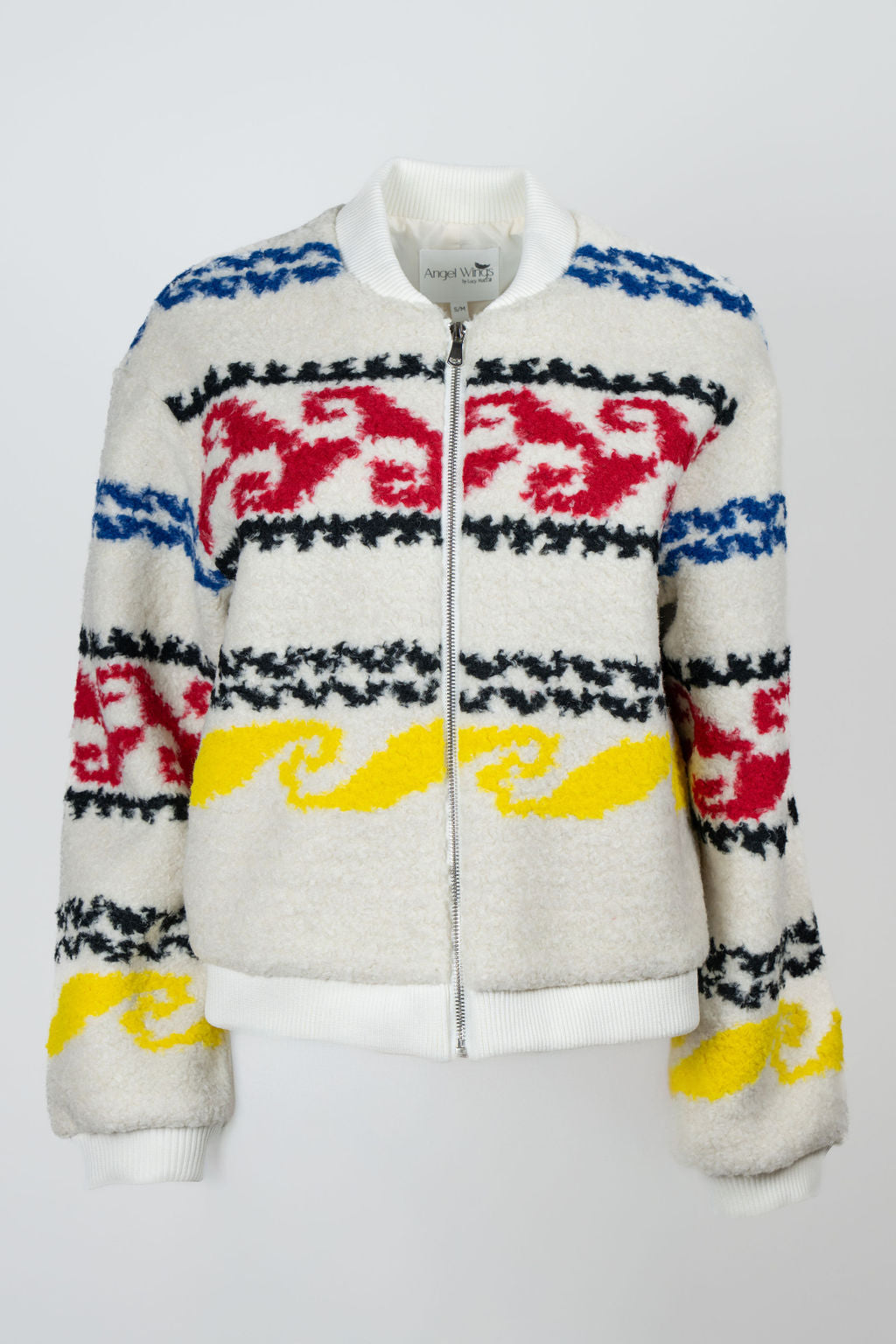 Woman wearing oversized Aztec faux shearling bomber jacket with white jeans – Bonnies Bomber by Angel Wings by Lucy