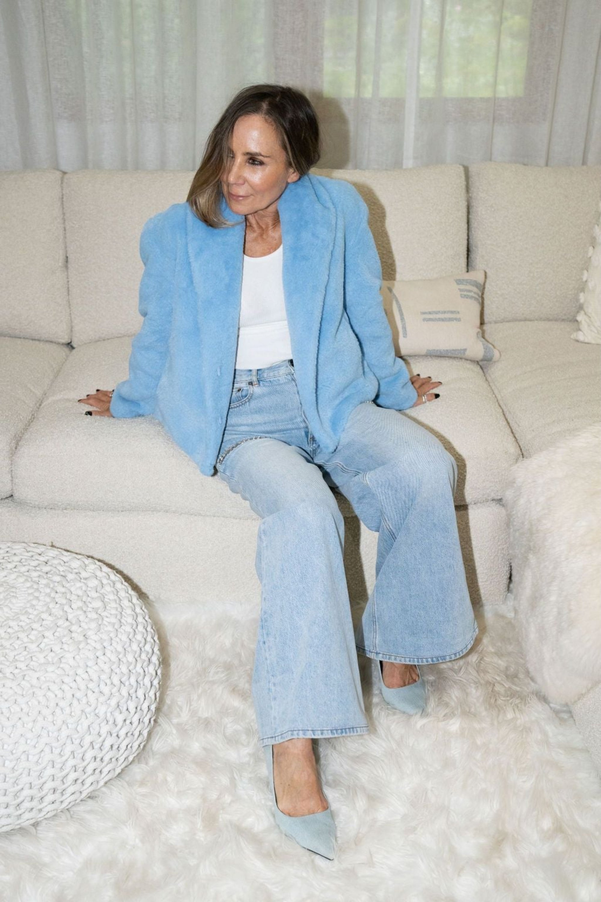 Woman wearing cropped sky blue faux fur jacket with wide-leg denim – Bear Den Crop Jacket by Angel Wings by Lucy