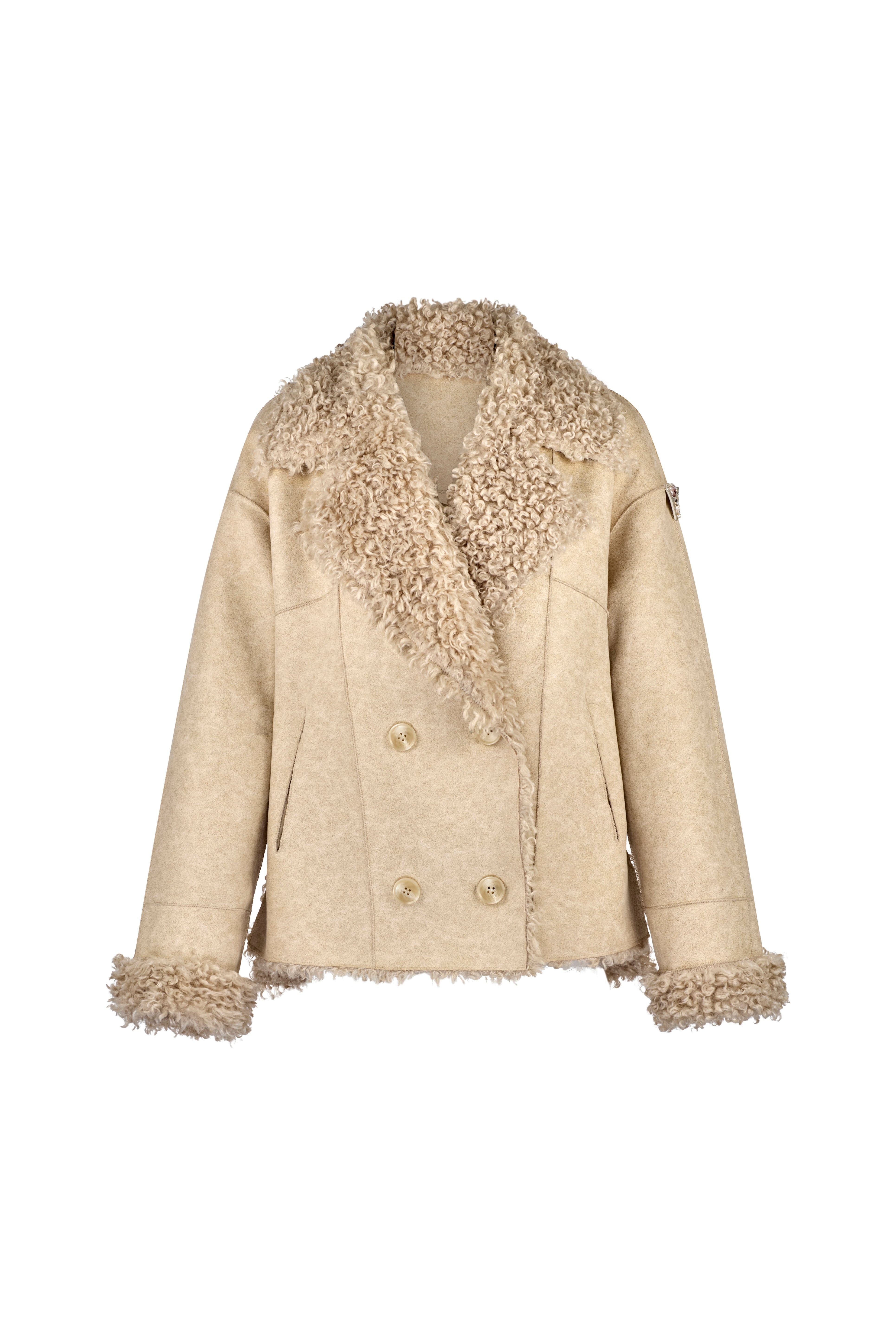Flat lay of Angel Wings by Lucy Two arrows jacket with sherling