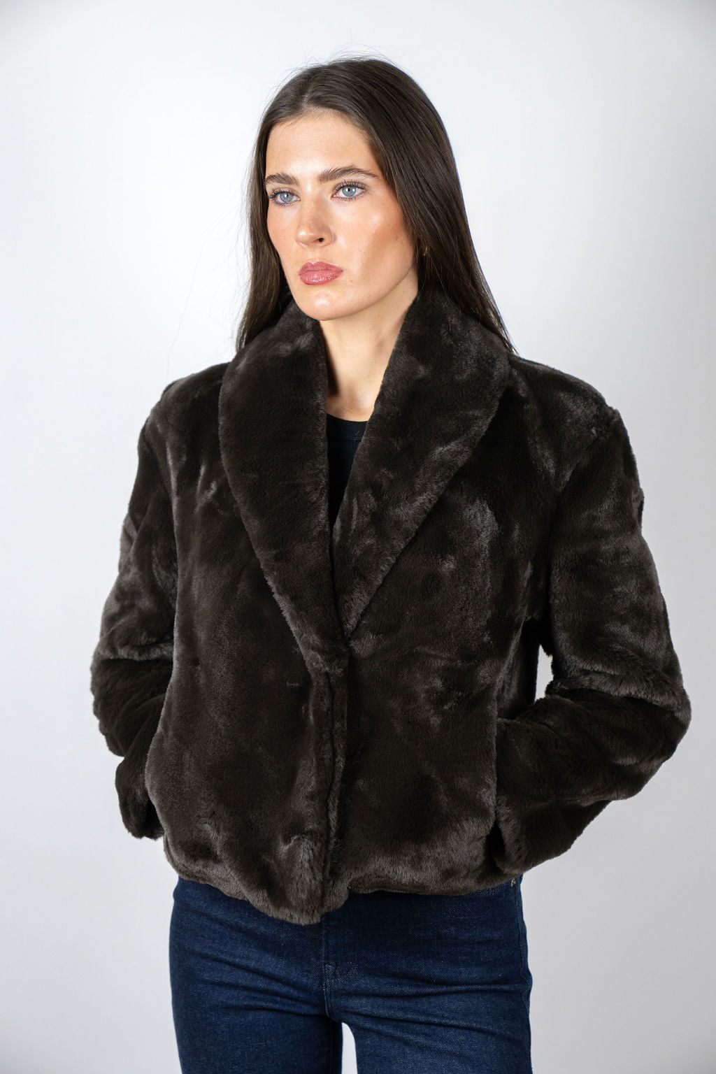 Model wearing the Bear Den Crop Jacket in Chocolate by Angel Wings by Lucy, a luxury faux fur cropped jacket designed for elevated winter styling.