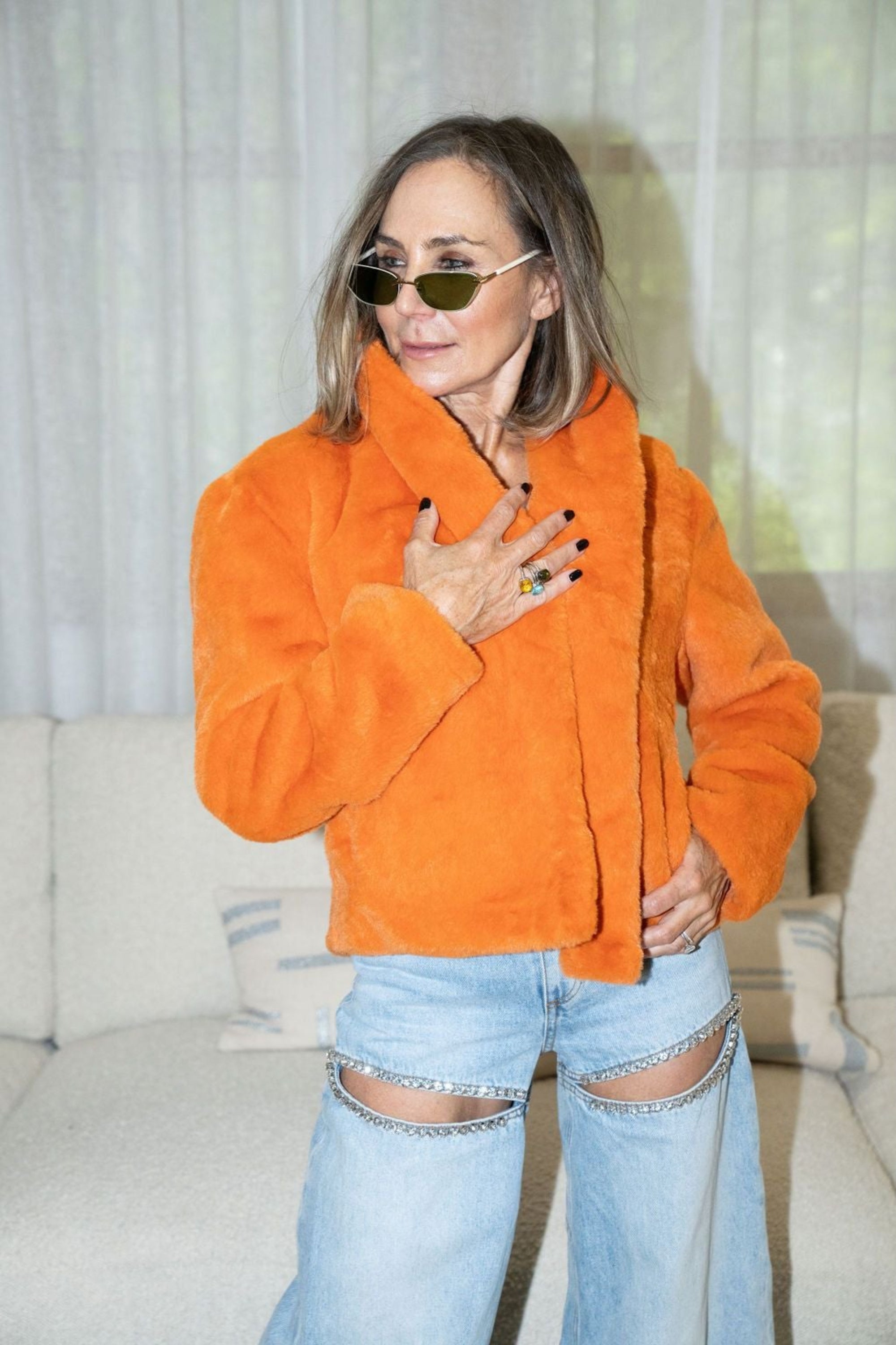 Woman wearing cropped orange faux fur jacket with high collar — Bear Den Crop Jacket by Angel Wings by Lucy