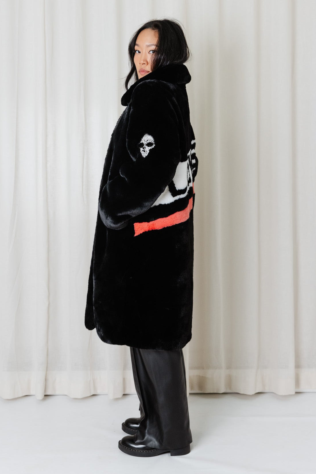 Angel Wings Mr Grey Love Skull black faux-fur coat featuring signature LOVE artwork at the back.